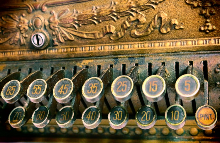 ornate gold antique cash register