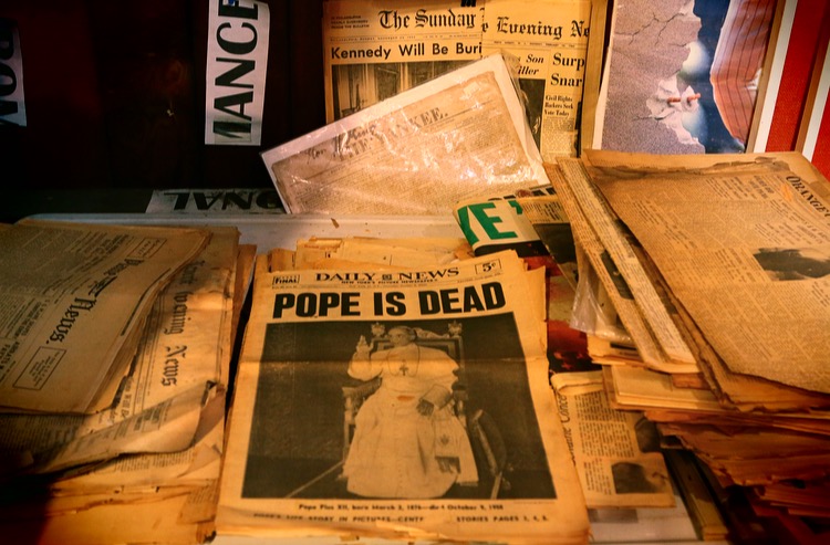 old yellow newspaper daily news front cover the pope is dead
