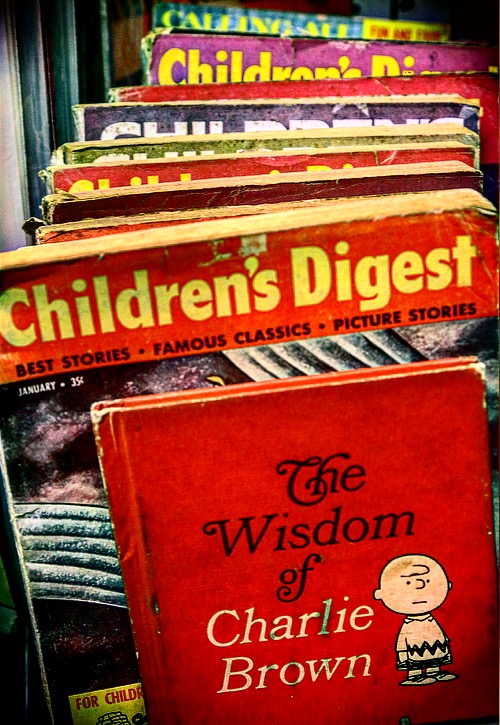 old vintage Children's Digest and The Wisdom of Charlie Brown
