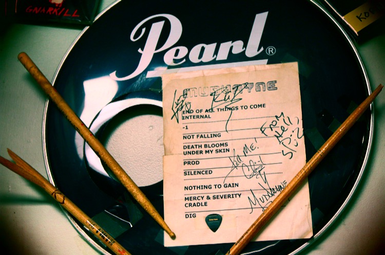 autograph and drumsticks