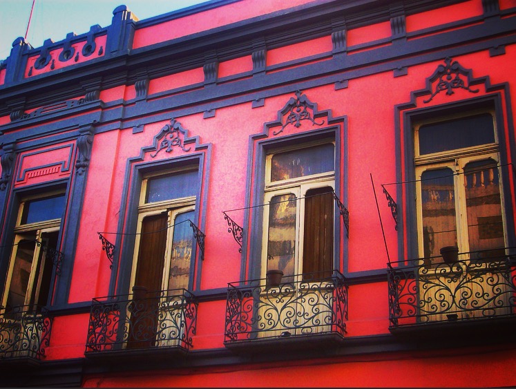 colorful decorative windows and building design in Puebla, Mexico
