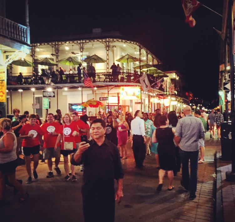 lively scene on Bourbon Street, French Quarter, New Orleans