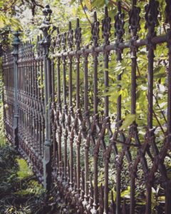 wrought iron fence in the Garden District, New Orleans, Louisiana