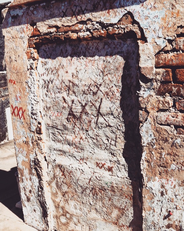 "X" marks on the tomb of Voodoo Queen Marie Laveau New Orleans cemetery