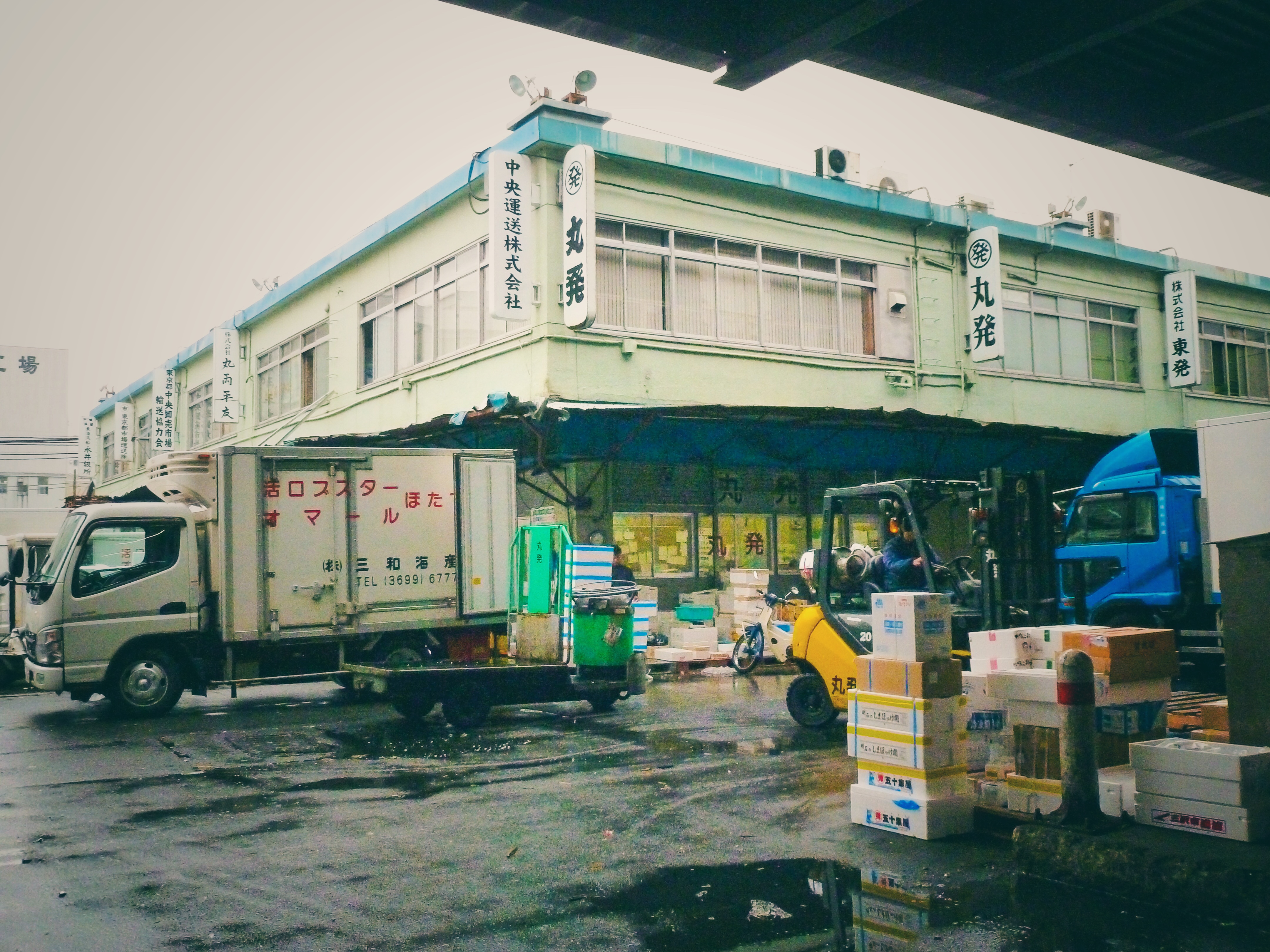 Tsukiji Fish Market, Tokyo, Japan nostalgia exterior market scene & trucks