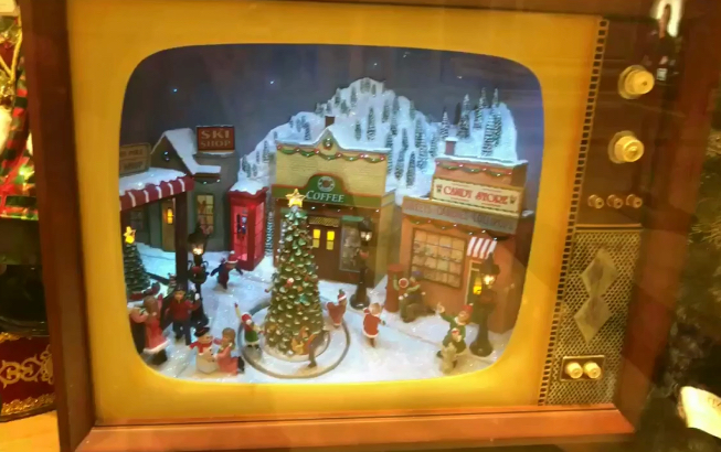 Christmas Village Display inside Vintage Television
