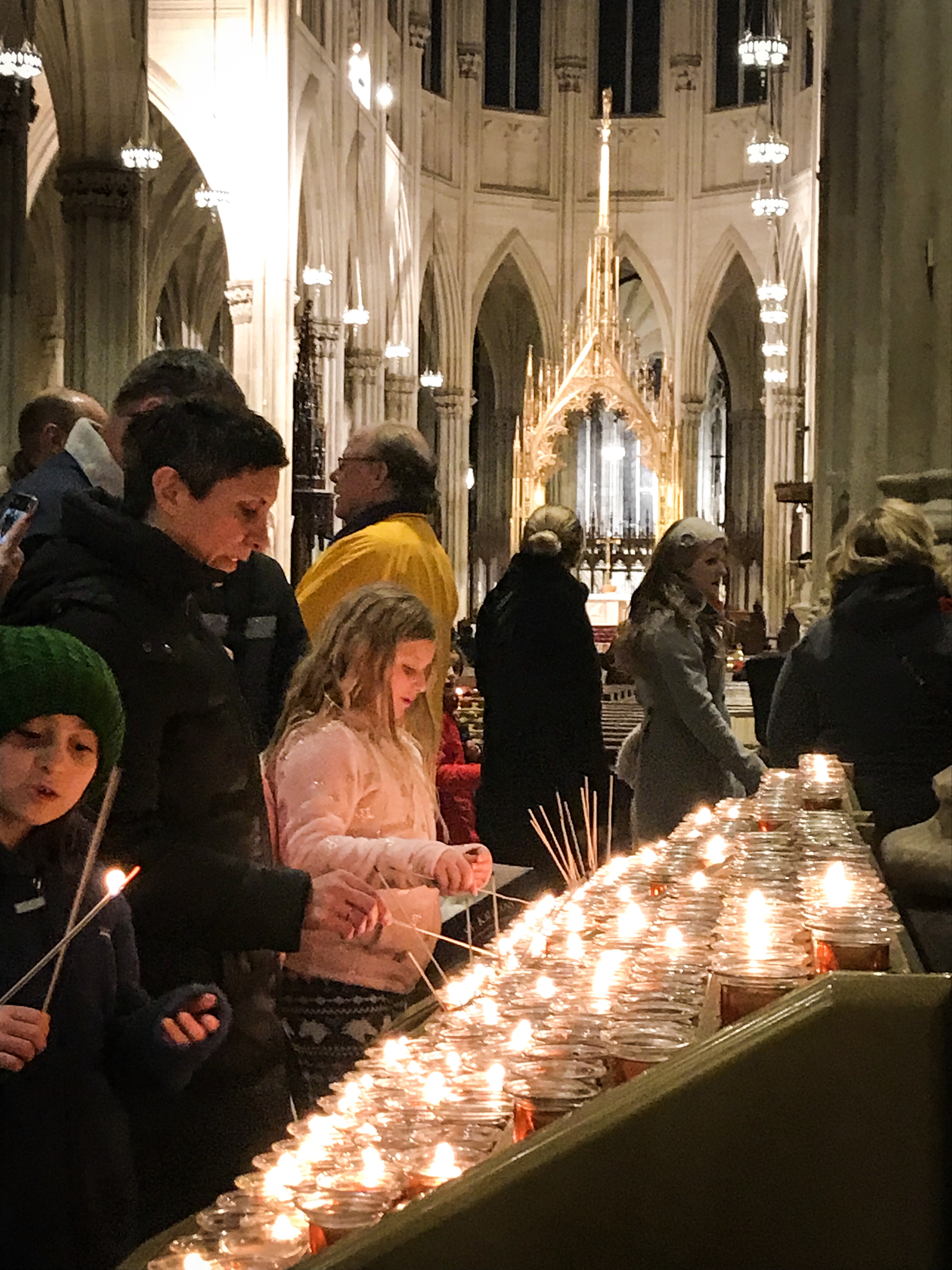 Visitor's Inside St. Patrick's Cathedral in New York