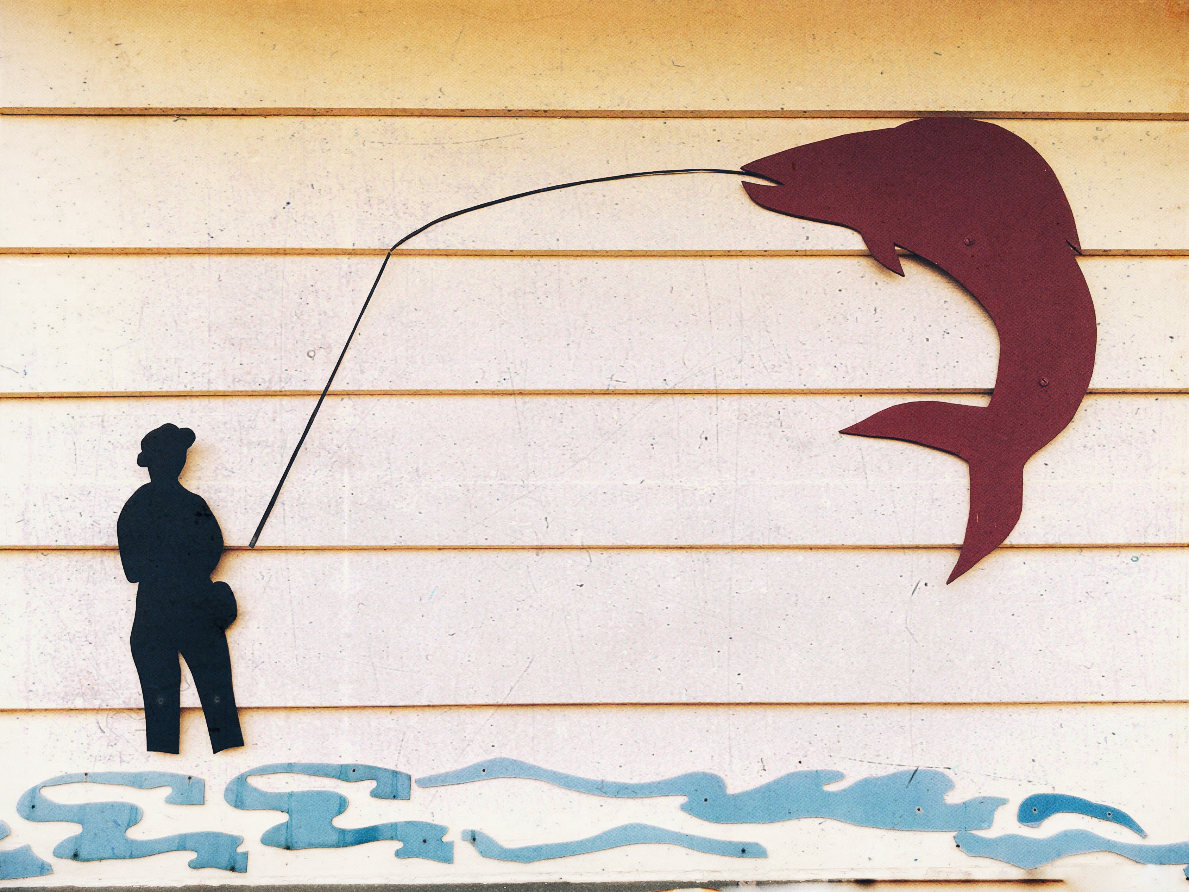 Man catching fish Design on exterior of The Fisherman Restaurant, Phoenixville, Pennsylvania
