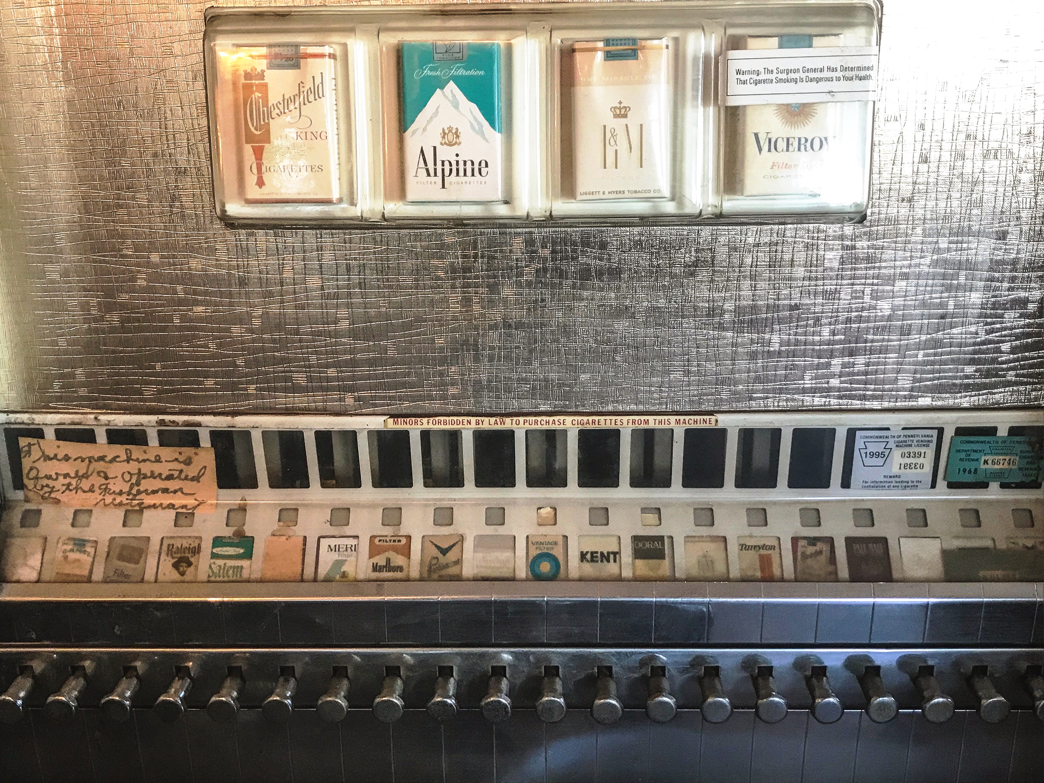 Vintage cigarette machine at The Fisherman Restaurant, Phoenixville, Pennsylvania