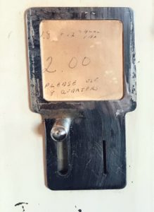 Coin-operated vintage cigarette vending machine at The Fisherman Restaurant, Phoenixville, Pennsylvania