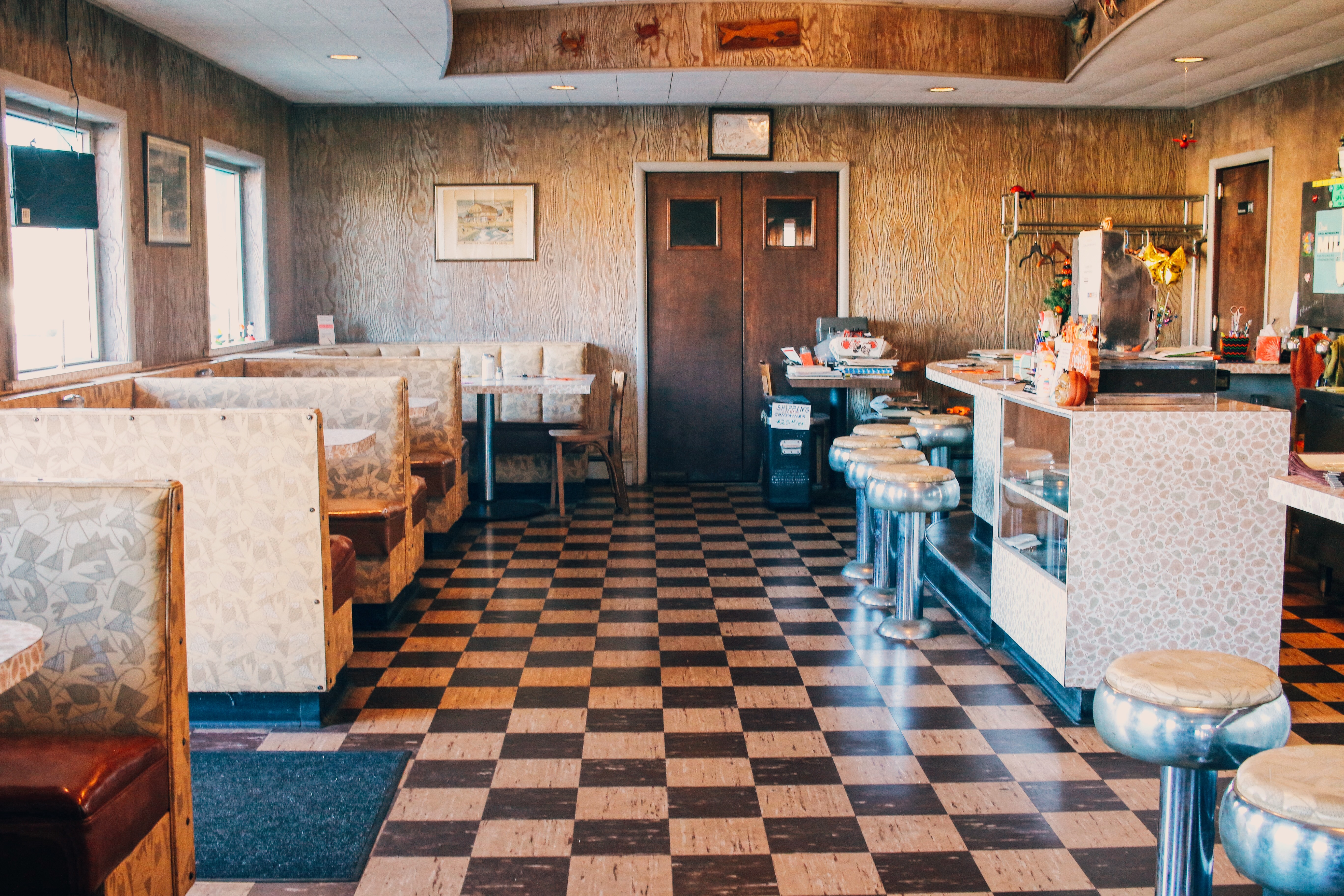 Wide angle view of The Fisherman Restaurant in Phoenixville, Pennsylvania and the double doors leading to the back room