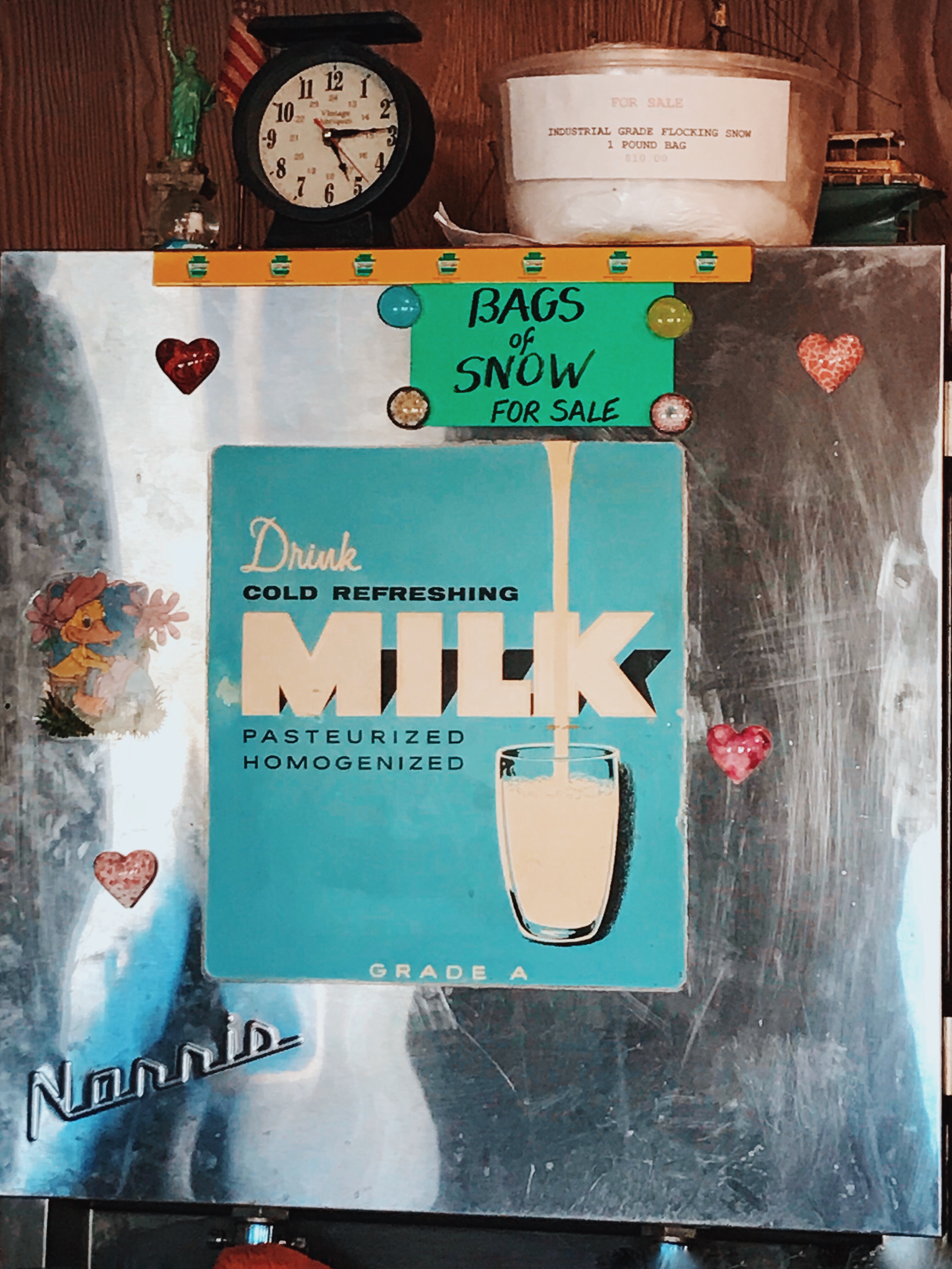 Norris Milk Dispenser and signs at The Fisherman Restaurant in Phoenixville, Pennsylvania