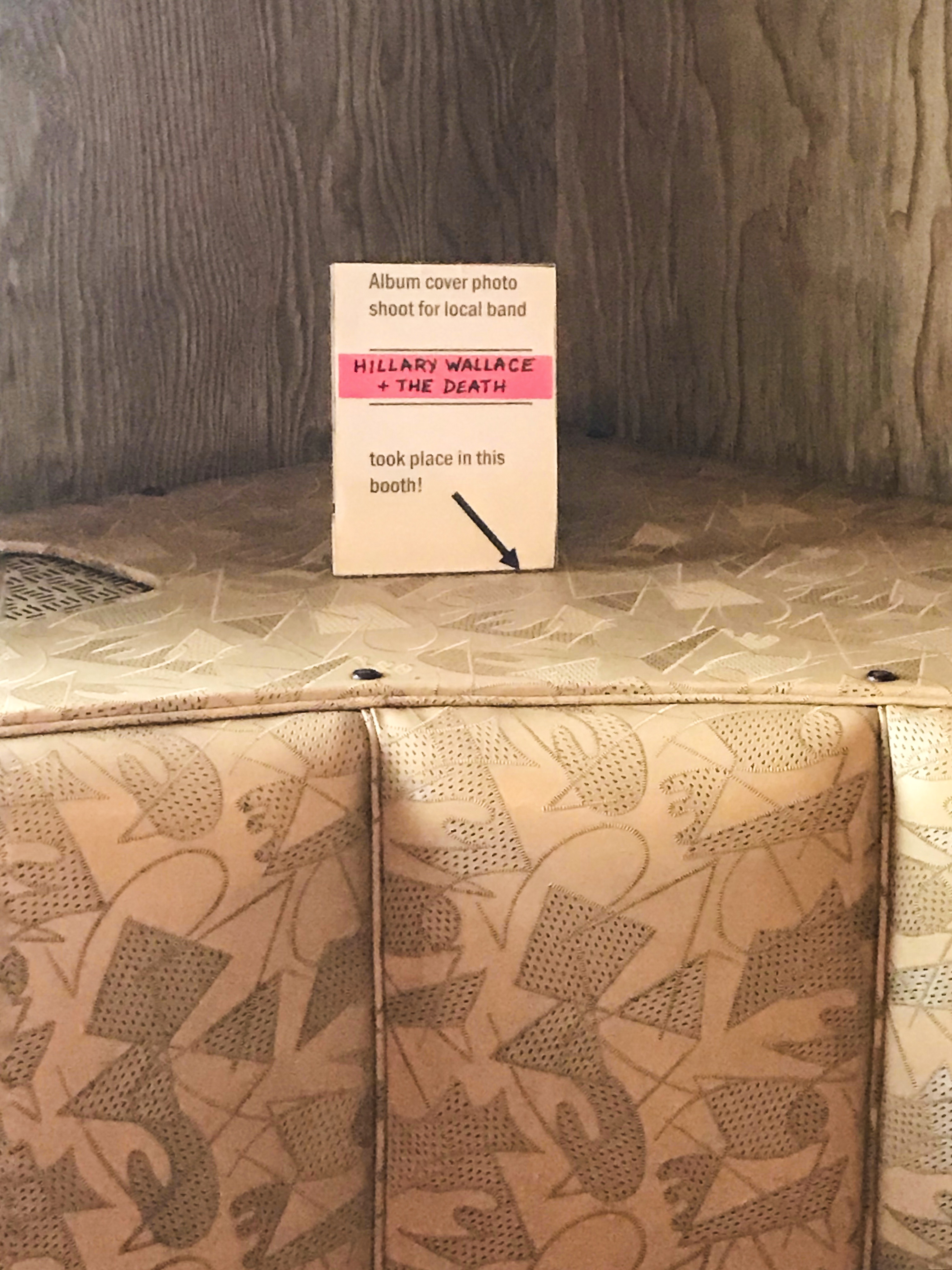 Sign on the booth where a photo shoot for the album cover for local band "Hillary Wallace + The Death" took place, The Fisherman Restaurant in Phoenixville, Pennsylvania