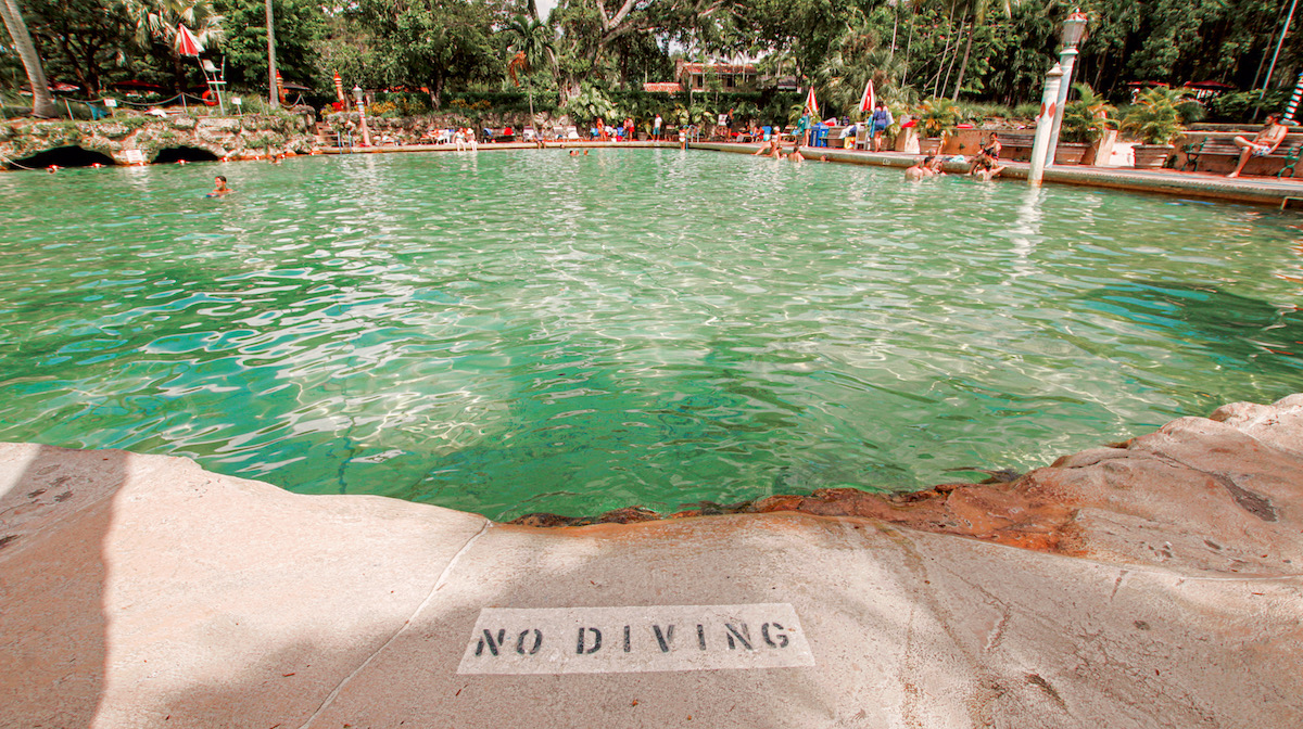 Hopeless Nostalgic. Venetian Pool no diving sign