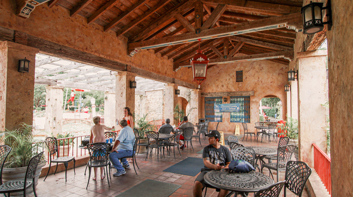 Hopeless Nostalgic. Venetian Pool outdoor seating